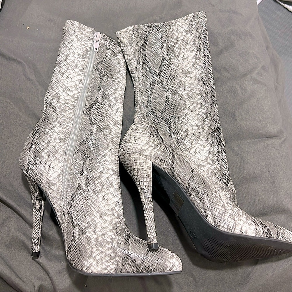 Size 7 Snakeskin high heel Boots